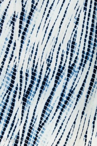A wonderful piece of antique Japanese yanagi shibori, willow patterned tie dye on hand loomed cotton made with botanical indigo dye. 

The graceful pattern was created by hand pleating the cotton and  ...