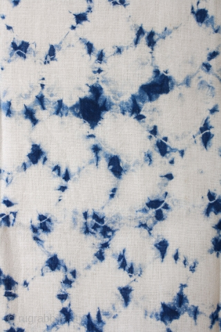 This a large swath of Japanese shibori cotton. Shibori is a Japanese term for several methods of dying cloth with a pattern by binding, stitching, folding, twisting, compressing, or capping. A simple  ...