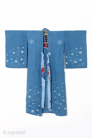 This is a Japanese cotton boy's kimono with elaborately dyed dots, and a brilliant red sea bream, or porgy. 

This child's kimono, which dates back to the early Showa period, was worn  ...