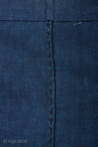 This is a large, Japanese antique indigo dyed cotton noren from the Meiji period. The fabric itself is made of thick, hand spun, and hand woven cotton. It is dyed with natural  ...