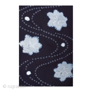 This is a Japanese indigo dyed cotton shibori kimono. A combination of shibori dying techniques are used to achieve this beautiful stream and maple leaf motif. The meandering stream pattern is made  ...