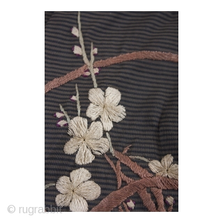 A charming silk bag which has been hand embroidered with a fan, cherry blossom and bamboo motif. Likely used to present a gift. There is one small hole in each of the  ...