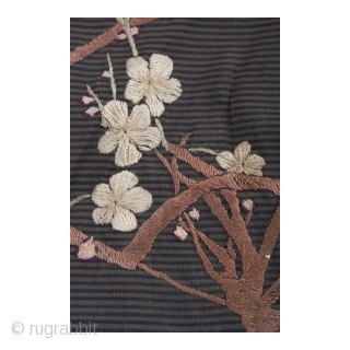 A charming silk bag which has been hand embroidered with a fan, cherry blossom and bamboo motif. Likely used to present a gift. There is one small hole in each of the  ...