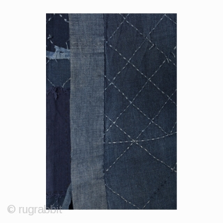 This is cotton noragi or Japanese worker's jacket. Made entirely of indigo, this noragi's hand-stitched sashiko design is a simple and geometric diamond pattern. From the characters sewn to the inside of  ...