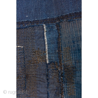 This is an antique Japanese boro farmer's workwear jacket called a noragi. 

The textile is made of hand spun cotton which has been dyed in natural, botanical indigo and woven into a  ...