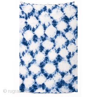 This a large swath of Japanese shibori cotton. Shibori is a Japanese term for several methods of dying cloth with a pattern by binding, stitching, folding, twisting, compressing, or capping. A simple  ...