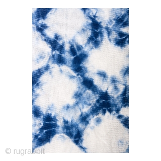 This a large swath of Japanese shibori cotton. Shibori is a Japanese term for several methods of dying cloth with a pattern by binding, stitching, folding, twisting, compressing, or capping. A simple  ...