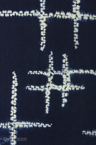 This is a striking  indigo dyed cotton shibori yukata. 

The shibori technique that is demonstrated here is Ori-nui shibori. Here the cloth is pinched with fingers along the lines of the  ...