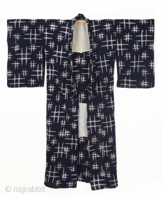 This is a striking  indigo dyed cotton shibori yukata. 

The shibori technique that is demonstrated here is Ori-nui shibori. Here the cloth is pinched with fingers along the lines of the  ...