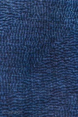 This is a Japanese sashiko noragi, or quilted coat, from Shonai, Yamagata prefecture of Japan. 

This jacket's entire surface is dyed with a deep natural indigo and is densely sashiko stitched. The  ...