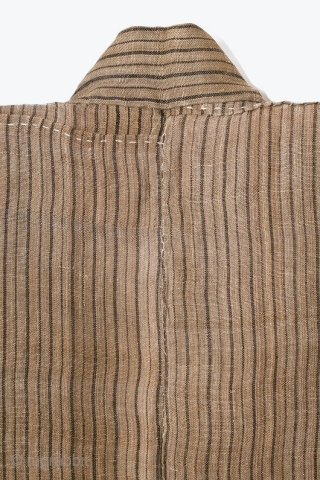 This is an Antique Japanese Bashofu Noragi, Banana Fiber Work Jacket

This is an antique striped bashofu noragi, or work jacket.

Kijōka-bashōfu is the Japanese craft of making cloth from the bashō or Japanese  ...