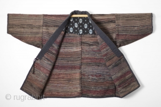 This is a handsome work jacket made entirely of sakiori in earthy and warm colors. Sakiori describes a weaving technique in which shreds torn from older cloth, such as kimono or futon,  ...