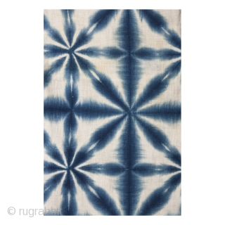 This is a striking shibori dyed han juban, which is often worn underneath a kimono. Shibori is a Japanese dying technique where patterns are made by binding, stiching, folding, twisting, and compressing  ...