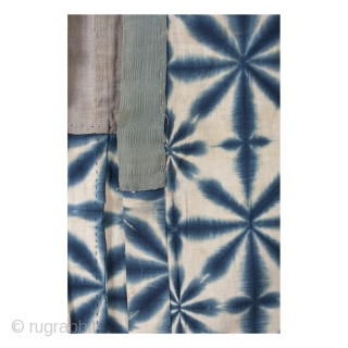 This is a striking shibori dyed han juban, which is often worn underneath a kimono. Shibori is a Japanese dying technique where patterns are made by binding, stiching, folding, twisting, and compressing  ...