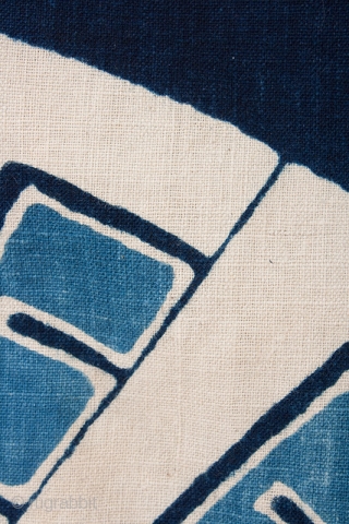 This is a vintage Japanese indigo dyed furoshiki, or wrapping cloth. The cloth is comprised of four 14" panels of fabric which have been stitched together and decorated with a tsutsugaki rice  ...