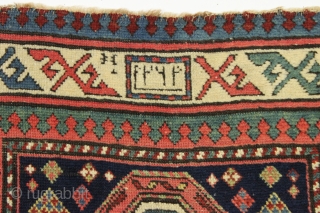 19th century Caucasian Chan-Karabagh prayer rug.  Look in your Kaffel book for its fraternal but undated twin.               