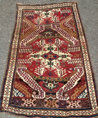 Two birds with one rug!  Kurdish (?), 19th century.  Coltrane-esque riff on an old Caucasian standard.  Beefy, floppy handle.  Glossy wool.  Excellent condition.  All organic dyes.  ...