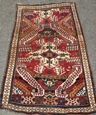 Two birds with one rug!  Kurdish (?), 19th century.  Coltrane-esque riff on an old Caucasian standard.  Beefy, floppy handle.  Glossy wool.  Excellent condition.  All organic dyes.  ...