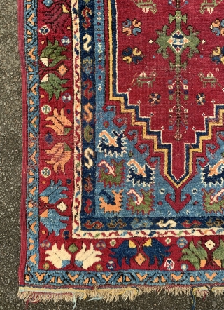 Antique Rabat rug. 19th century.165x103cm. A lovely colourful older example. Some wear and a small hole in the field.              