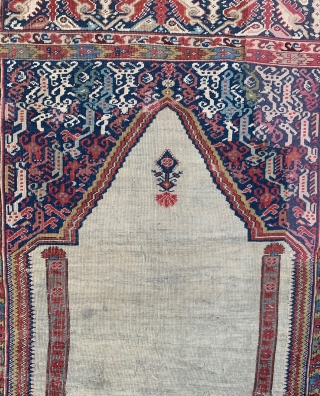 18th century Ghiordes prayer rug. Large border repair.                         