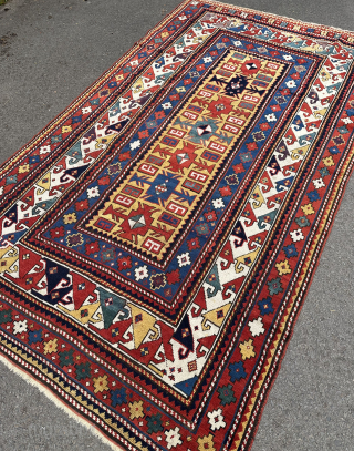 Antique Kazak rug. 19th century. This rug has a good design and particularly good colours. Minor edge repairs..               