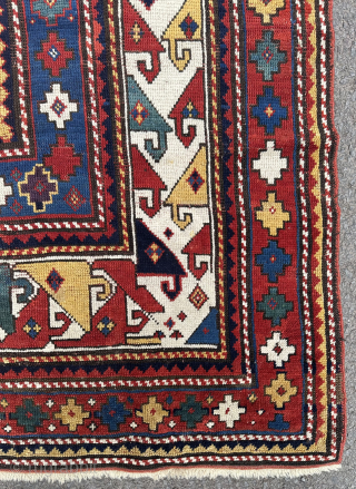 Antique Kazak rug. 19th century. This rug has a good design and particularly good colours. Minor edge repairs..               