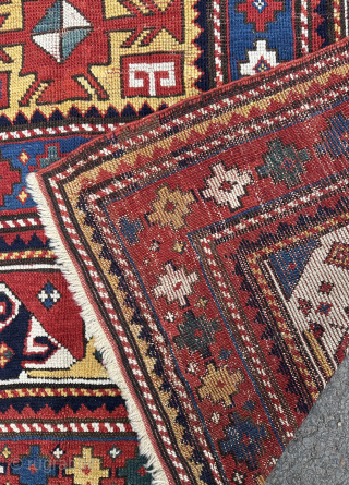 Antique Kazak rug. 19th century. This rug has a good design and particularly good colours. Minor edge repairs..               