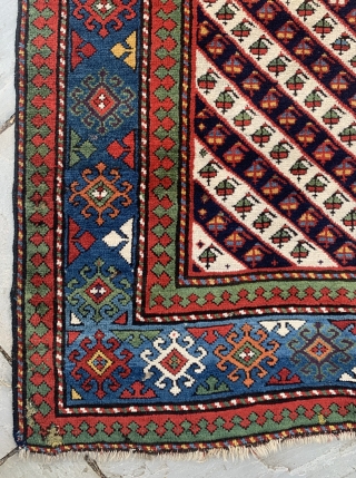 Good quality antique Caucasian Genje rug in good pile with excellent colours. 262x100cm.                    