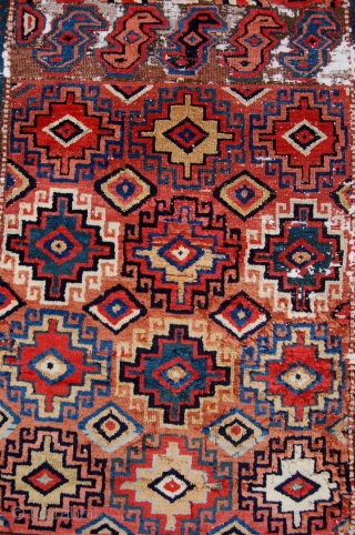 Unusual north west persian runner. Probably shashavan, possibly third quarter of the 19th century. Beautiful colours and lovely wool. Some wear and moth damage. 287 x 74cm.      