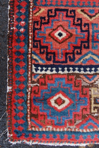 Unusual north west persian runner. Probably shashavan, possibly third quarter of the 19th century. Beautiful colours and lovely wool. Some wear and moth damage. 287 x 74cm.      