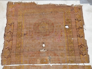 Khotan circa 1900 fragments. faded fuchsine ground.
Size is 366 x 218 cm or 12ft x 7.2 ft                