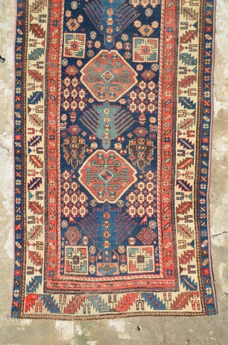 An Antique Caucaian runner (karabagh) late 19th century or 1st half of 20th century, red is fast and when I washed that the red runs on other colors.
size is 270 x 110  ...