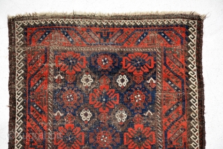 Baluch rug 1910, size is 185 x 103 cm, overall fair condition, black is too worn but flowers are in good condition. a good example of baluch.      