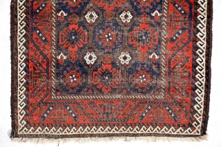 Baluch rug 1910, size is 185 x 103 cm, overall fair condition, black is too worn but flowers are in good condition. a good example of baluch.      