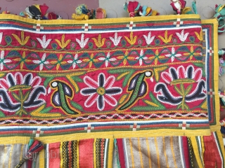 Rabari Mochi hand embroidered   long Toran  from bhujodi village Kutch region Gujarat with very fine work with vegetables dyes the size of the Toran is 112 inch X 18  ...