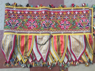 Rabari Mochi hand embroidered   long Toran  from bhujodi village Kutch region Gujarat with very fine work with vegetables dyes the size of the Toran is 112 inch X 18  ...