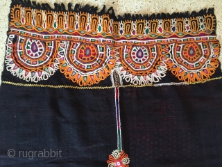 This is kutchi Rabari brides head cloth from bhavanipar Kutch region Gujarat the raw wool shawl is embroided with looped stich work.the raw woollen ground with the and dyed element that mirror  ...