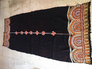 This is kutchi Rabari brides head cloth from bhavanipar Kutch region Gujarat the raw wool shawl is embroided with looped stich work.the raw woollen ground with the and dyed element that mirror  ...