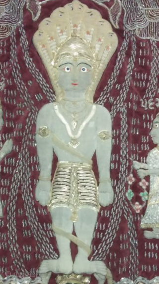 Real silver and gold foil work of Jain temple hanging hand embroidered from Gujarat India the size of the hanging is 23 inches X 37 inches.       