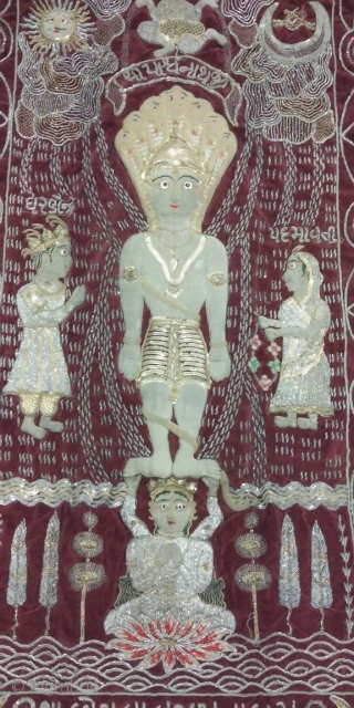 Real silver and gold foil work of Jain temple hanging hand embroidered from Gujarat India the size of the hanging is 23 inches X 37 inches.       