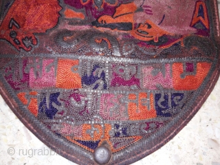 Rugrabbit note: this is not 18th century but a contemporary reproduction/ fake.




18th century mochi hand embroided leather purse from jadeja family from kutch gujarat with its very very fine intricate embroidery work  ...