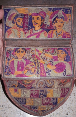 Rugrabbit note: this is not 18th century but a contemporary reproduction/ fake.




18th century mochi hand embroided leather purse from jadeja family from kutch gujarat with its very very fine intricate embroidery work  ...