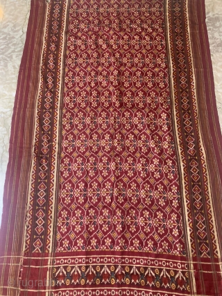 An Rare Theen phool bhat Patola Sari, Double Ikat silk from Patan Gujarat 1850 - 1875 c .This Patola known as Theen phool bhat three flowers design.This Patola has one of the  ...