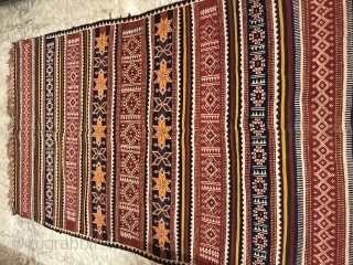 Durrie handwoven of cotton with vibrant colours with geometrical design all over from Thar desert region of Rajasthan India.the durrie is in very find condition without any holes or stains.the size of  ...