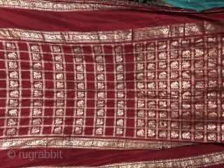 Vintage real zari sari with elephants and peacocks motifs all over gold on royal red colour made in Varanasi Uttar Pradesh India 1900c. on famous mulberry silk of Mysore the size of  ...