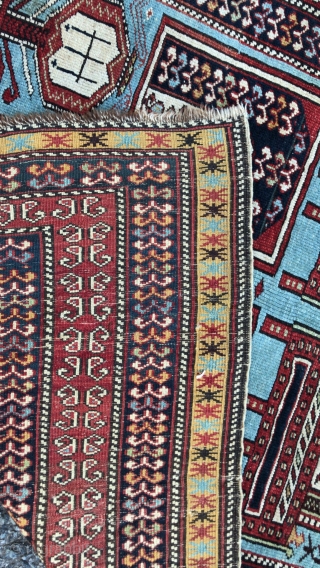  This is an antique Tachte Shirvan rug woven during the last quarter of the 19th century circa 1880. It has a rare powder blue background color with an even more rare  ...