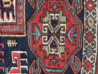 Shahsavan 21"x 22" Silk wefted and has some light bule silk highlights in the small corner medallions                