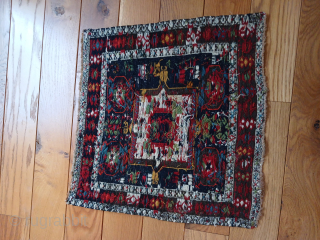 Shahsavan 21"x 22" Silk wefted and has some light bule silk highlights in the small corner medallions                
