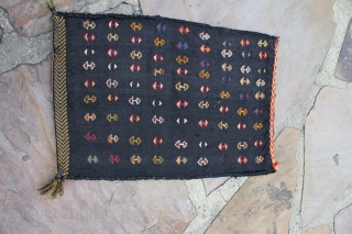 A top Qashqai spindle bag made using a flat-weave technique and all natural dyes. It measures 1.1 x1.7 Ft

The front is made up of repeating row of the famous boteh motif made  ...