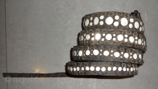 this is a rare old leather belt with conch inlay made by the lisu people of southwest china near the myangmar border and was worn by some men of this group. the  ...